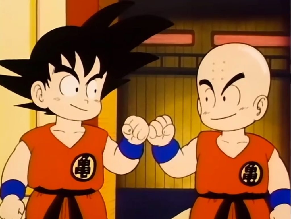 Krillin and Goku fistbumping